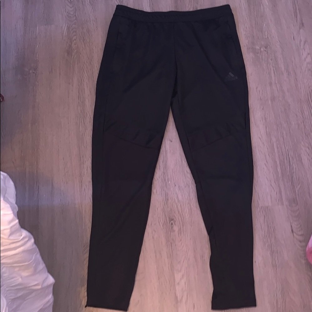 Black Adidas track pants